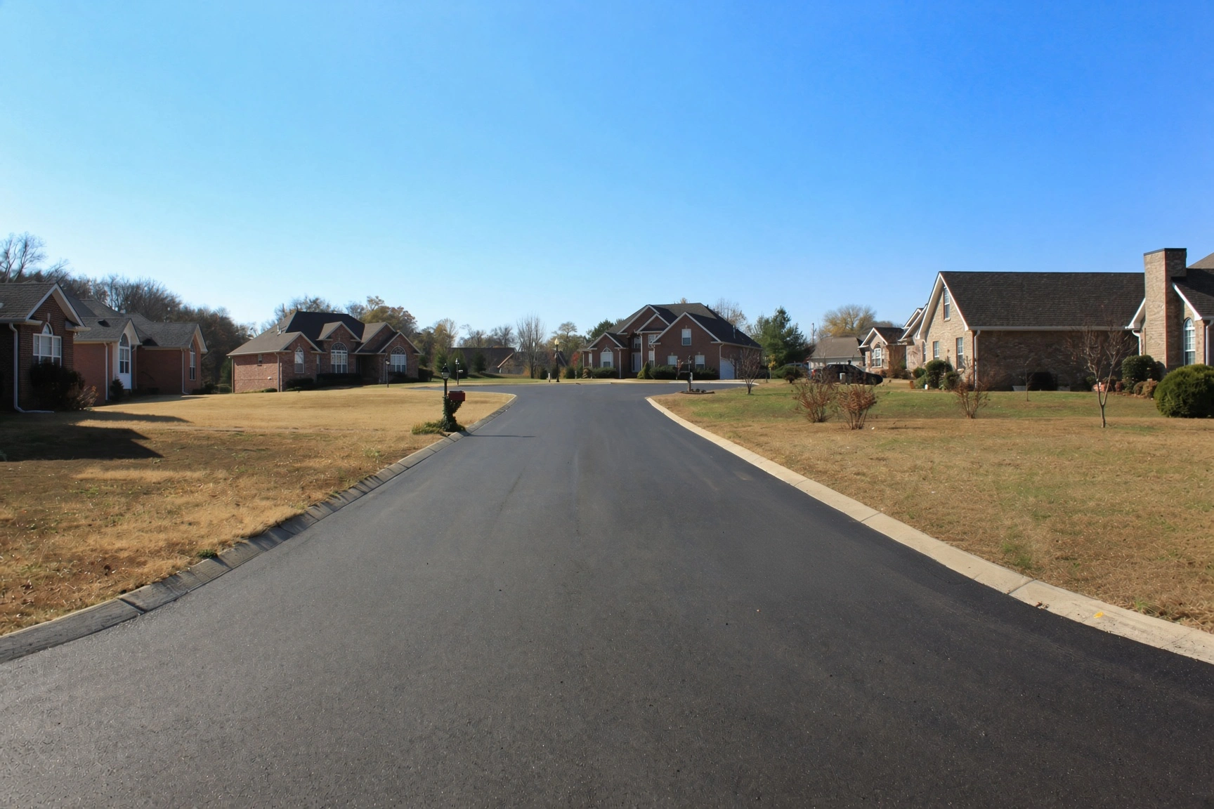 Newly paved asphalt driveway at a Knoxville Tennessee home