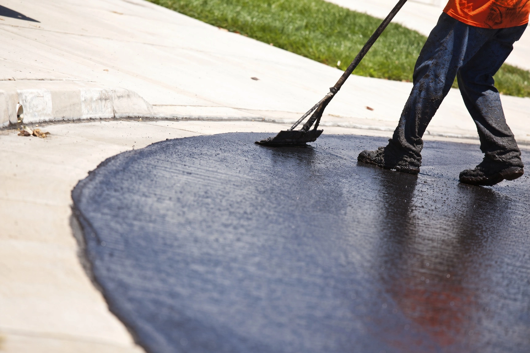 Asphalt milling machine resurfacing a parking lot in Knoxville Tennessee